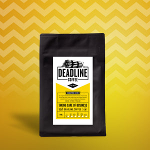 A bag of Deadline Coffee's Taking Care Of Business signature blend coffee